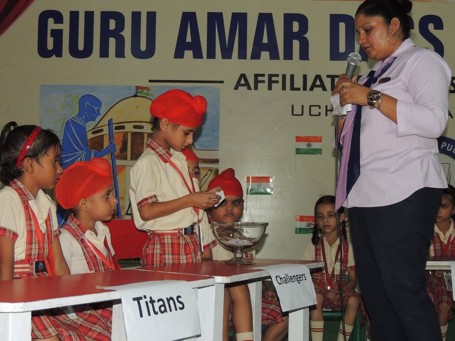 Children taking part in a class quiz