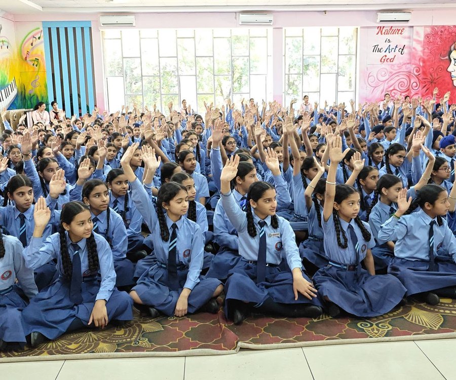 Pupils taking part in morning assembly