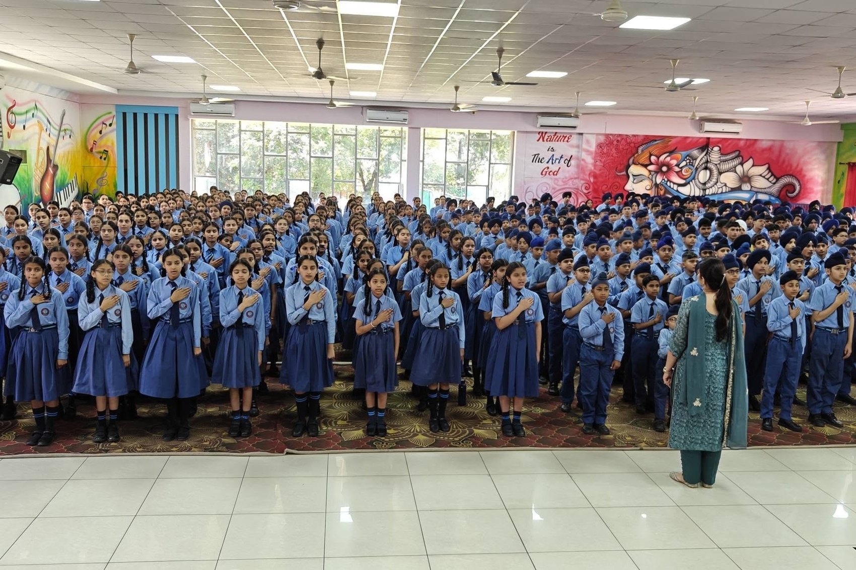 Pupils at morning assembly in the school hall